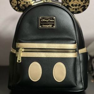 Disney Parks Pirates of the Caribbean Loungefly mini backpack with matching Ears